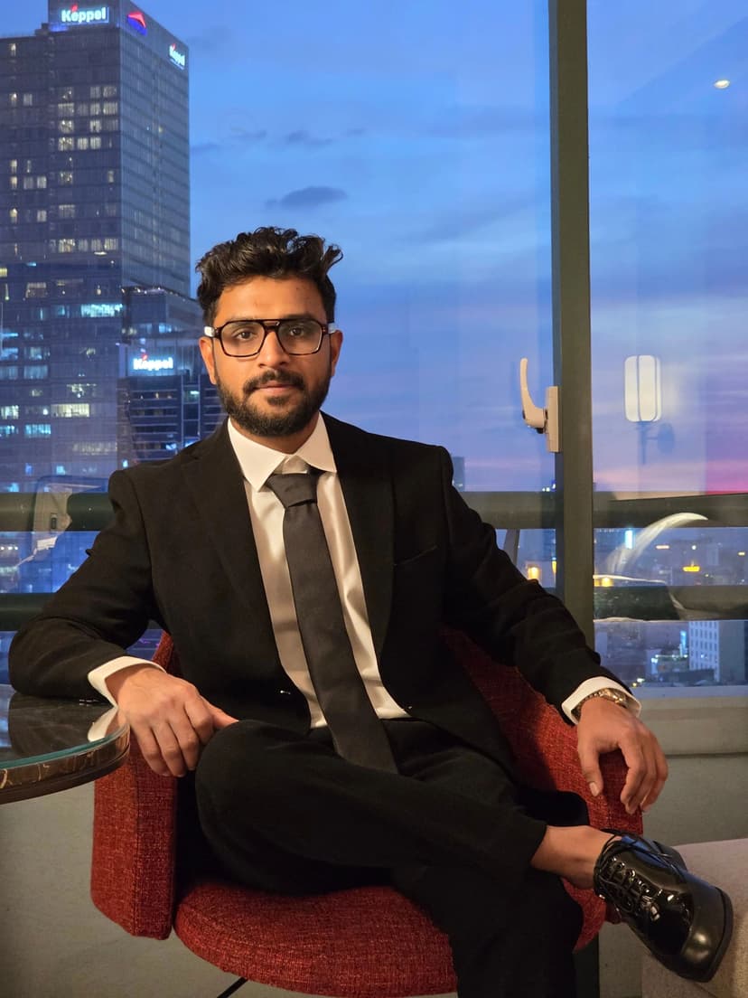 Illustration of a hand holding a phone with stock charts